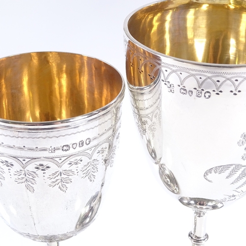 584 - 2 Victorian silver goblets, with engraved floral decoration and gilded interiors, by H J Lias & Son,... 