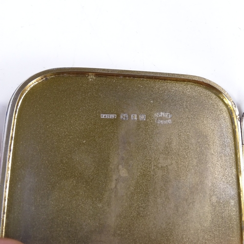 588 - An Art Deco Asprey's silver cigarette case, of rounded-edge square form with gilt interior, hallmark... 