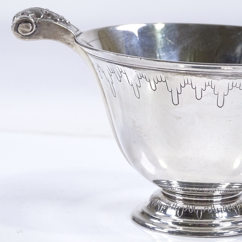 592 - A Garrard & Co silver 2-handled bowl, with cast acanthus leaf handles, hallmarks London 1936, diamet... 