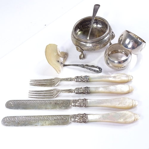 600 - Various silverware, including Victorian table salt, mother-of-pearl handled cutlery, napkin rings et... 