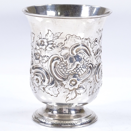 602 - An early 19th century silver fluted beaker, with relief embossed foliate and floral decoration, make... 