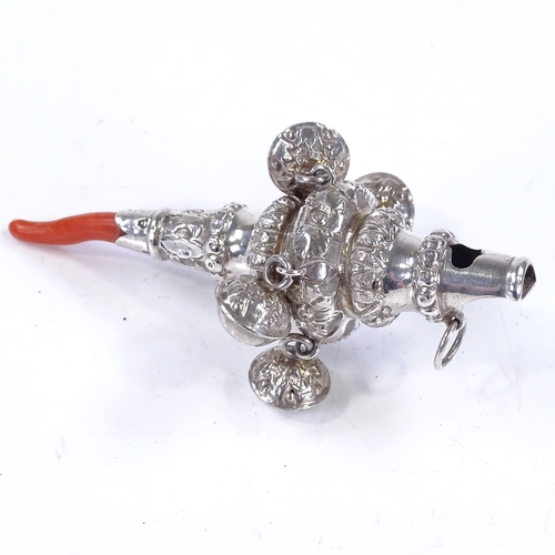 605 - A Victorian silver and coral baby's rattle/whistle, hallmarks Birmingham 1872, length 9cm