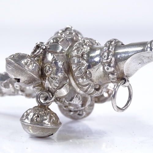 605 - A Victorian silver and coral baby's rattle/whistle, hallmarks Birmingham 1872, length 9cm