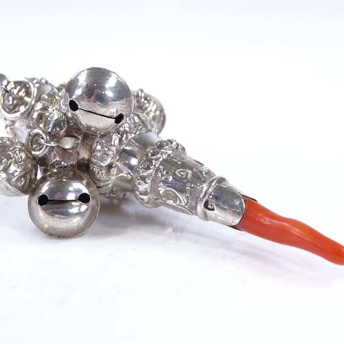 605 - A Victorian silver and coral baby's rattle/whistle, hallmarks Birmingham 1872, length 9cm