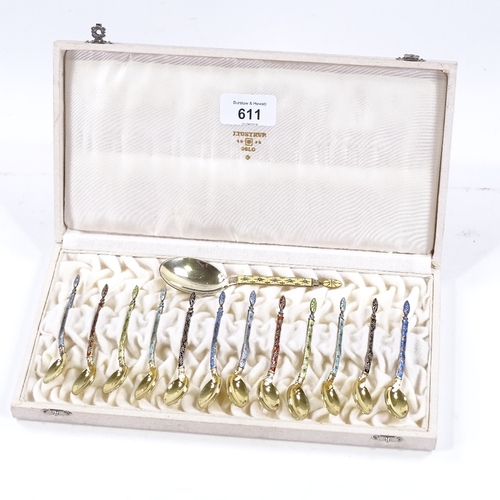 611 - A set of 12 Norwegian sterling silver-gilt and coloured enamel coffee spoons, and matching caddy spo... 