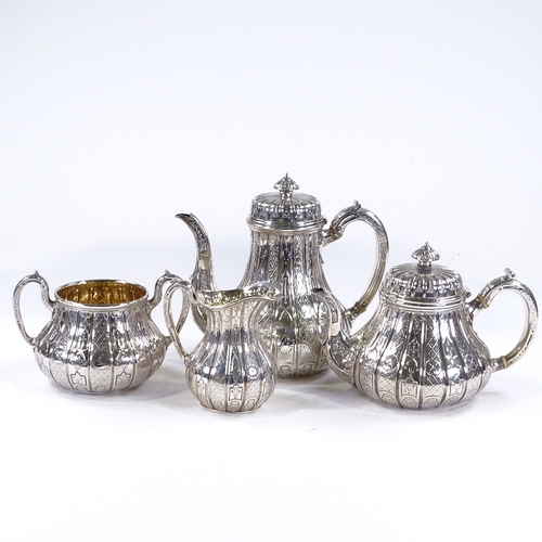 614 - A fine quality Victorian 4-piece silver tea and coffee set, with engraved and relief embossed panel ... 