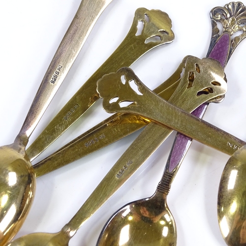 619 - A set of 8 Norwegian sterling silver-gilt and coloured enamel coffee spoons, with pierced terminals,... 