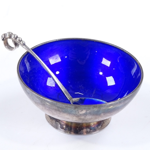 620 - A Danish sterling silver and blue enamel salt by Meka, bowl diameter 5cm, together with a similar bl... 