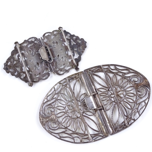 632 - 2 silver nurse's buckles with pierced and relief embossed decoration, smallest maker's marks CM, hal... 