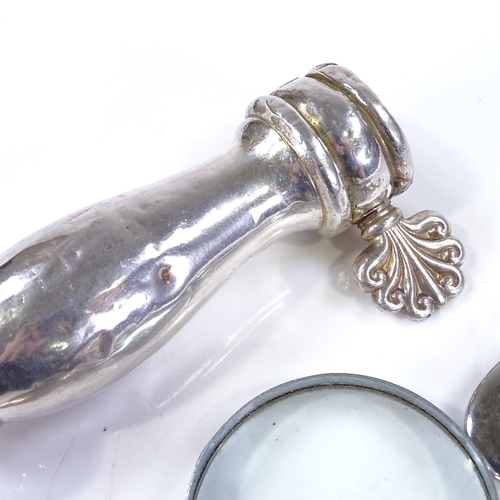 636 - Various silverware, including bottle opener, magnifying glass, and unmarked meat bone handle (4)