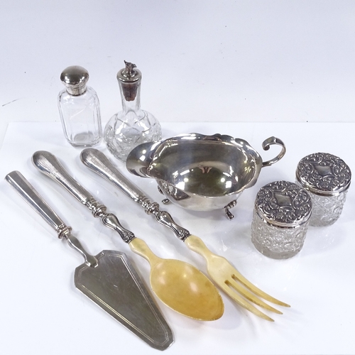 656 - Various silverware, including gravy boat, fox head tot bottle, salad servers etc