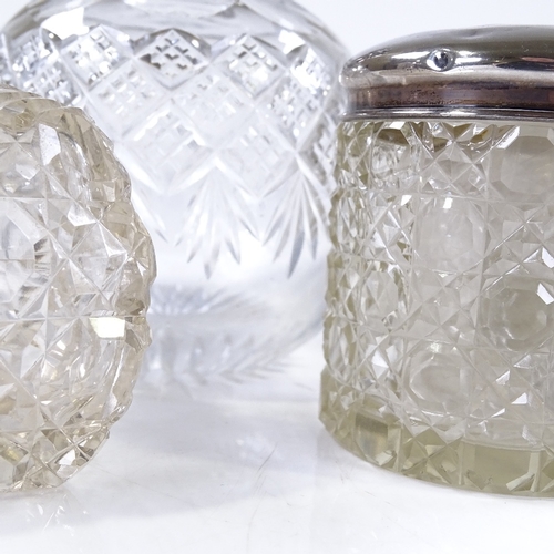 658 - 7 silver-topped dressing table jars