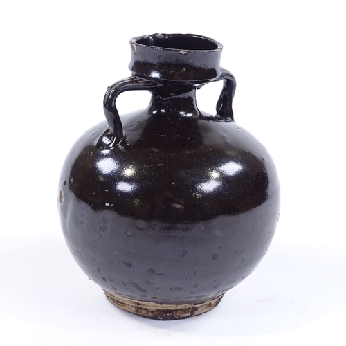 118 - A Chinese dark brown treacle glaze 2-handled jar, height 16cm