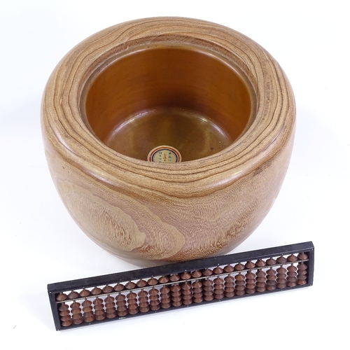 123 - A Japanese stained wood hibachi bowl, diameter 31cm, height 21cm, and a soroban