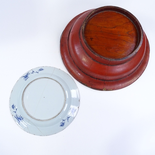 124 - A Chinese blue and white porcelain plate, 34cm diameter (A/F), and an Oriental gilded and lacquered ... 