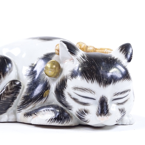 128 - A Chinese porcelain sleeping cat, circa 1900, length 17cm