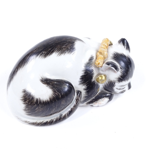 128 - A Chinese porcelain sleeping cat, circa 1900, length 17cm