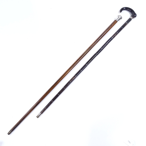 130 - A sectional horn walking stick, and a silver-topped snakewood walking cane