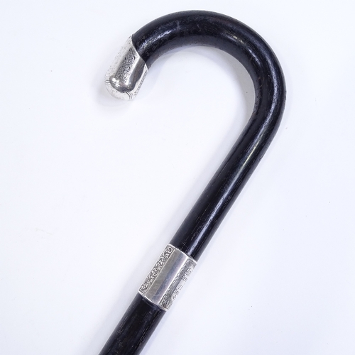 132 - An ebony walking stick with silver mounts, inscribed Ald T W Cain Deputy Mayor Isle of Man 27/9/34