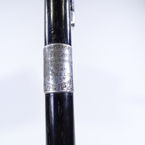 132 - An ebony walking stick with silver mounts, inscribed Ald T W Cain Deputy Mayor Isle of Man 27/9/34