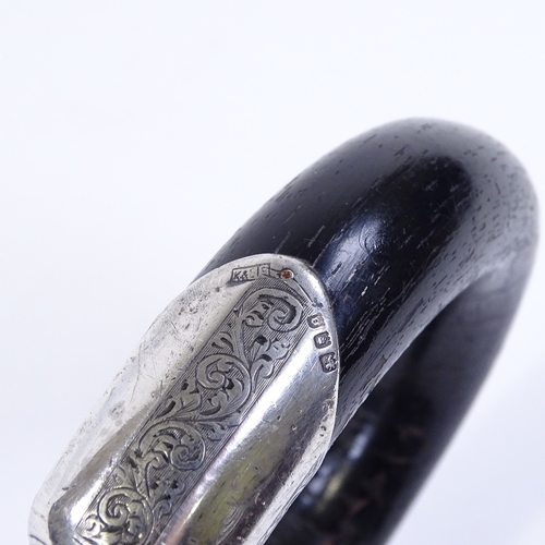 132 - An ebony walking stick with silver mounts, inscribed Ald T W Cain Deputy Mayor Isle of Man 27/9/34