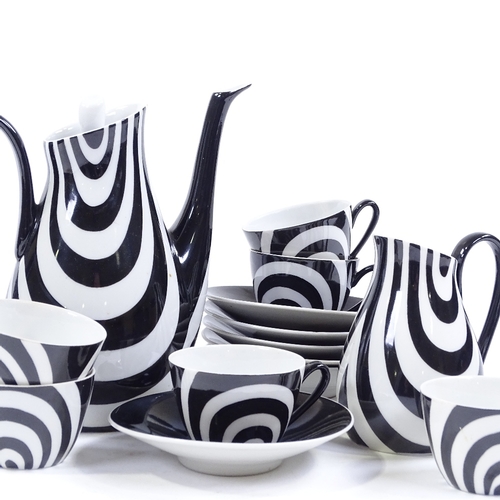 133 - Chodziez - Poland, a rare coffee set in black and white, hand painted and signed by B Opacki, dated ... 