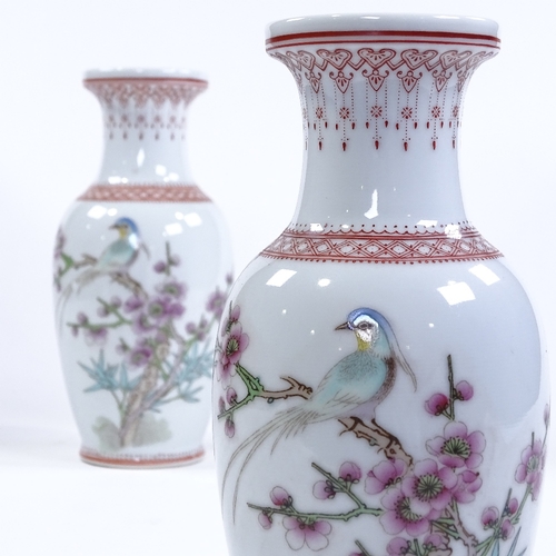 53 - A pair of Chinese Republic porcelain vases, hand painted birds and blossom, height 21cm
