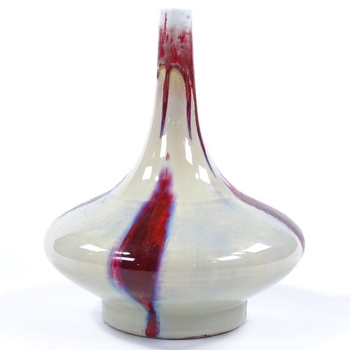 54 - A modern Chinese porcelain narrow-necked vase with red streak glaze, marks under base, height 30cm