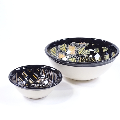 66 - Madoline Keeler (British born 1942), 2 Studio pottery bowls with abstract geometric designs, diamete... 