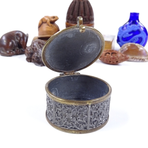 73 - A group of treen and other miniature items, including a 19th century carved and pierced nut box, len... 