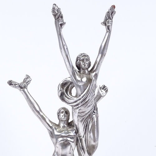 75 - A silver patinated bronze Classical sculpture depicting 2 figures holding laurel wreaths, on marble ... 