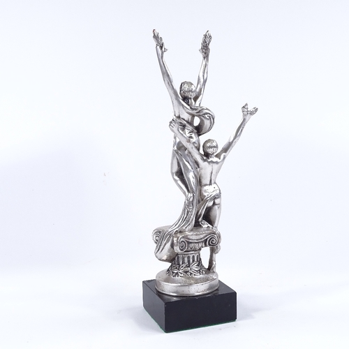 75 - A silver patinated bronze Classical sculpture depicting 2 figures holding laurel wreaths, on marble ... 