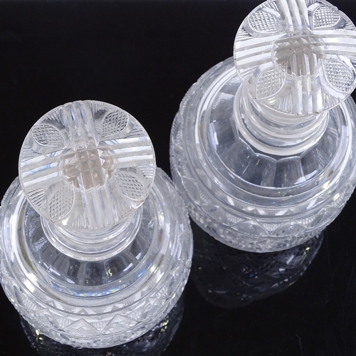 76 - A pair of 19th century cut-glass decanters with neck rings and mushroom stoppers, height 24cm