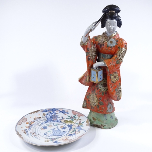 82 - A Japanese porcelain standing figure with painted and gilded robes, height 60cm, and a Japanese pain... 