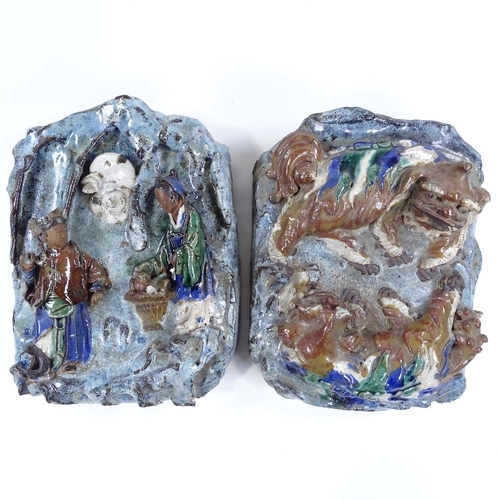 85 - A pair of Chinese Shiwan multi-colour glaze porcelain wall pockets, with relief moulded dogs of fo a... 