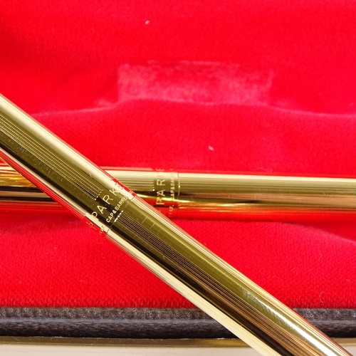 94 - A Parker gold plated ballpoint pen and propelling pencil set, new and unused condition, boxed