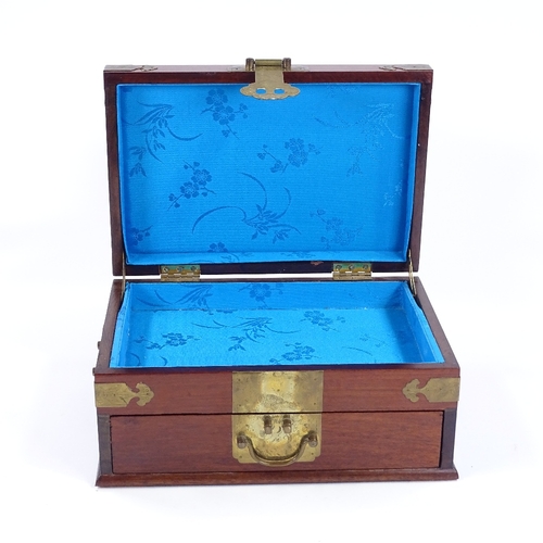 117 - A Chinese brass-bound mahogany jewel box, with inset green stone plaque to the lid, width 30cm