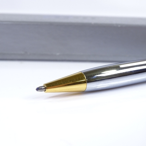 124 - A Cross ball pen, highly polished chrome/gold, new and boxed