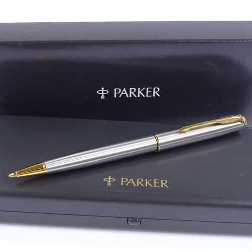 126 - A Parker Sonnet ball pen, stainless steel/gold, new and boxed