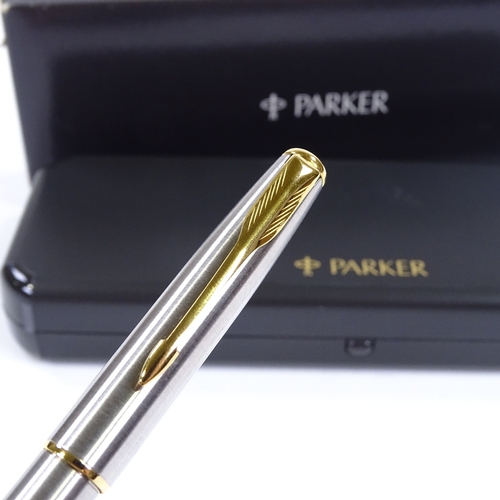 126 - A Parker Sonnet ball pen, stainless steel/gold, new and boxed