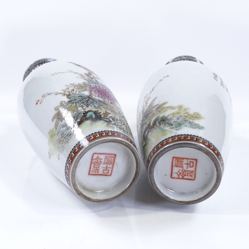 127 - A pair of Chinese white glaze porcelain vases, with hand painted birds, flowers and text, height 22c... 