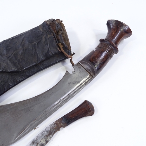 13 - A Second War Period Gurkha kukri knife, original leather scabbard, missing one small knife