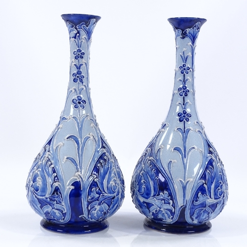 15 - A pair of James Macintyre Burslem Florian Ware narrow-necked vases, with relief floral decoration, r... 