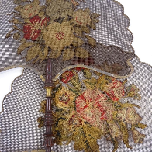 158 - A pair of 19th century fans with embroidered screens and turned wood handles, length 38cm