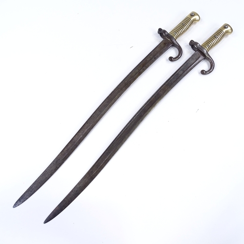 165 - A pair of 19th century French sword bayonets, length 69cm