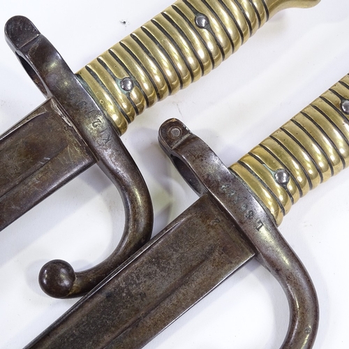 165 - A pair of 19th century French sword bayonets, length 69cm