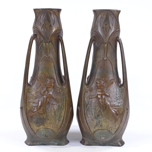 172 - A pair of Art Nouveau gilded and patinated spelter vases, circa 1900, by J Garnier, with relief drag... 