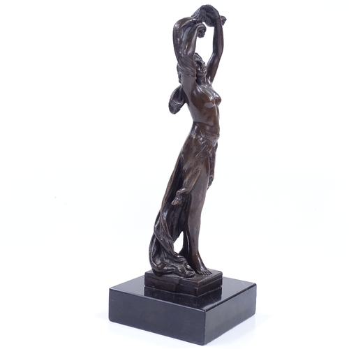 184 - A reproduction bronze standing nude figure on black marble base, height 31cm