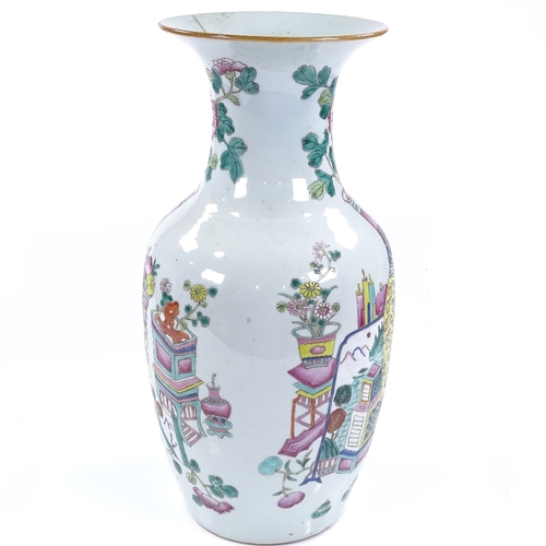 195 - A Chinese white glaze porcelain vase, with painted enamel designs, height 43cm, rim A/F