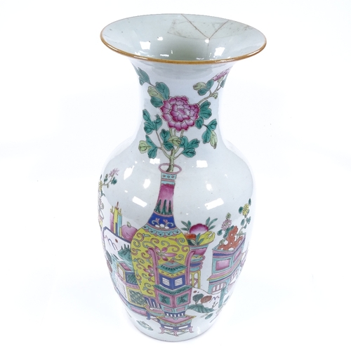 195 - A Chinese white glaze porcelain vase, with painted enamel designs, height 43cm, rim A/F